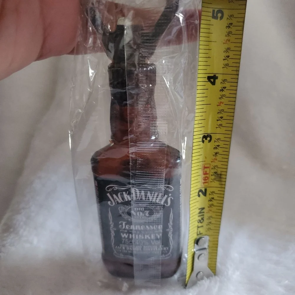 This that dark Jack Daniel 5 inch Bottle opener Magnet